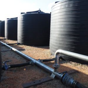 Line of Nu-Tank Round Molasses Storage Tanks