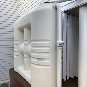 Nu-Tank White Slimline Water Tanks on deck against white clad house.