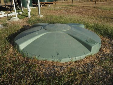 Septic Tank installed in ground. Foot trafficable roof visable.